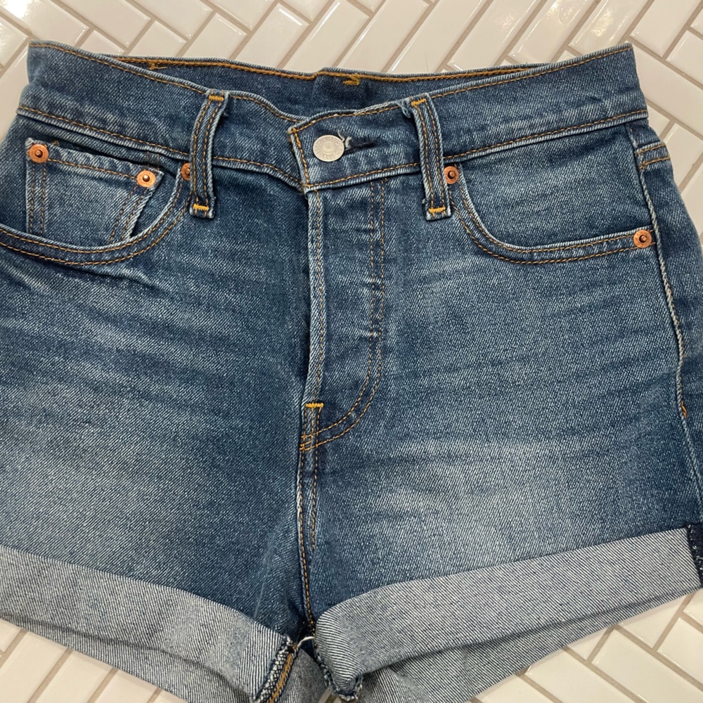 Blue Distressed Denim Jeans with Faded Look